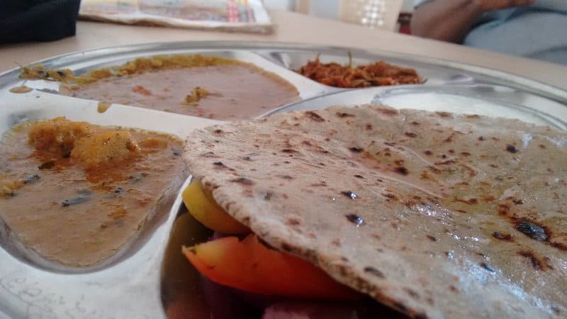 Roti with ker sangri (rightmost above the roti)